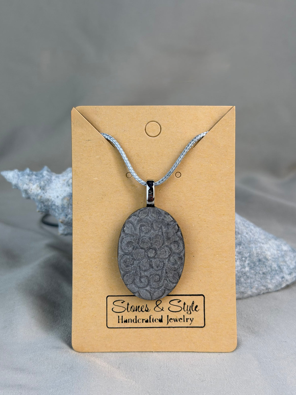 Carved Silver Sheen Obsidian Pendant Necklace