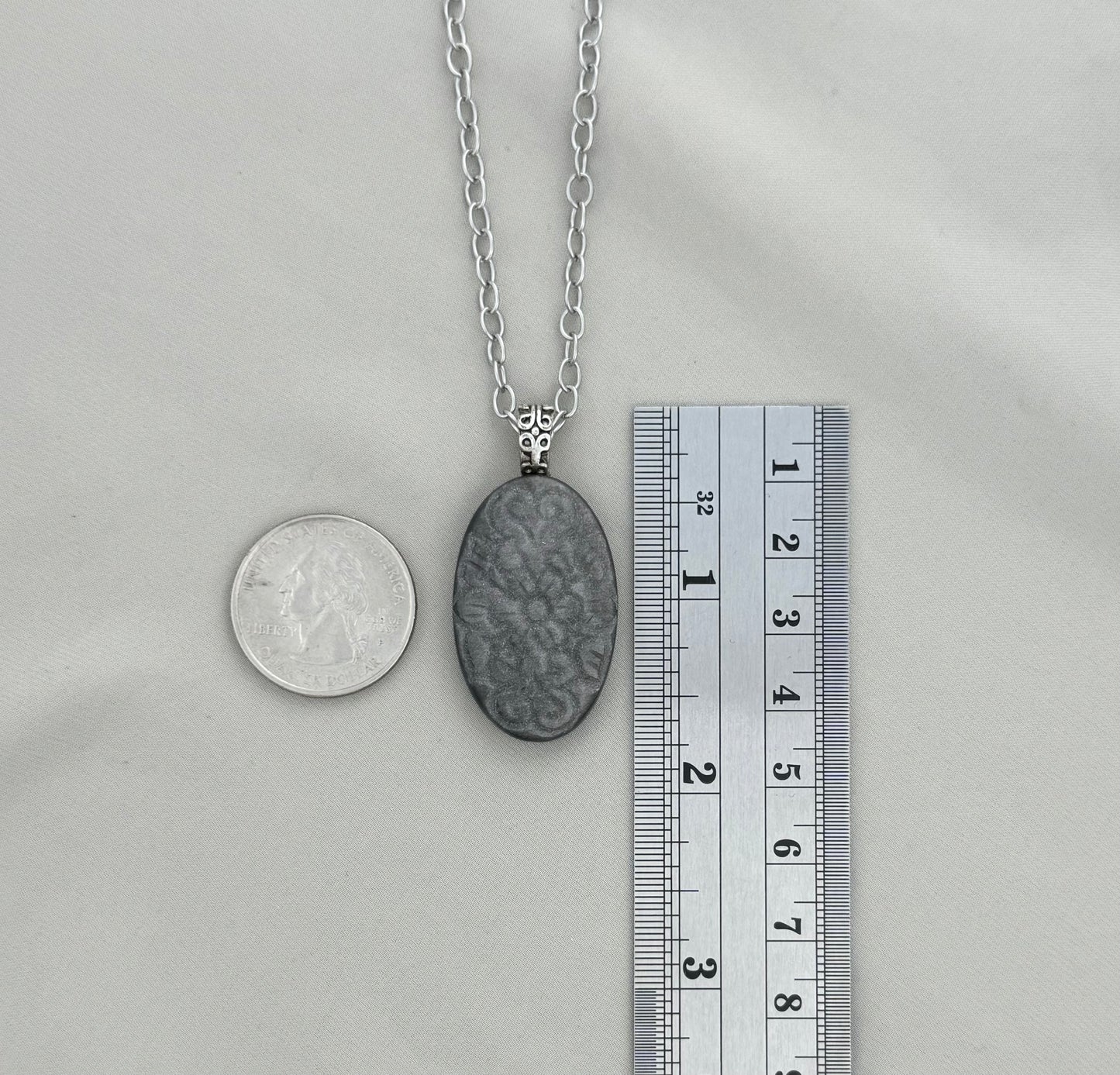 Carved Silver Sheen Obsidian Pendant Necklace